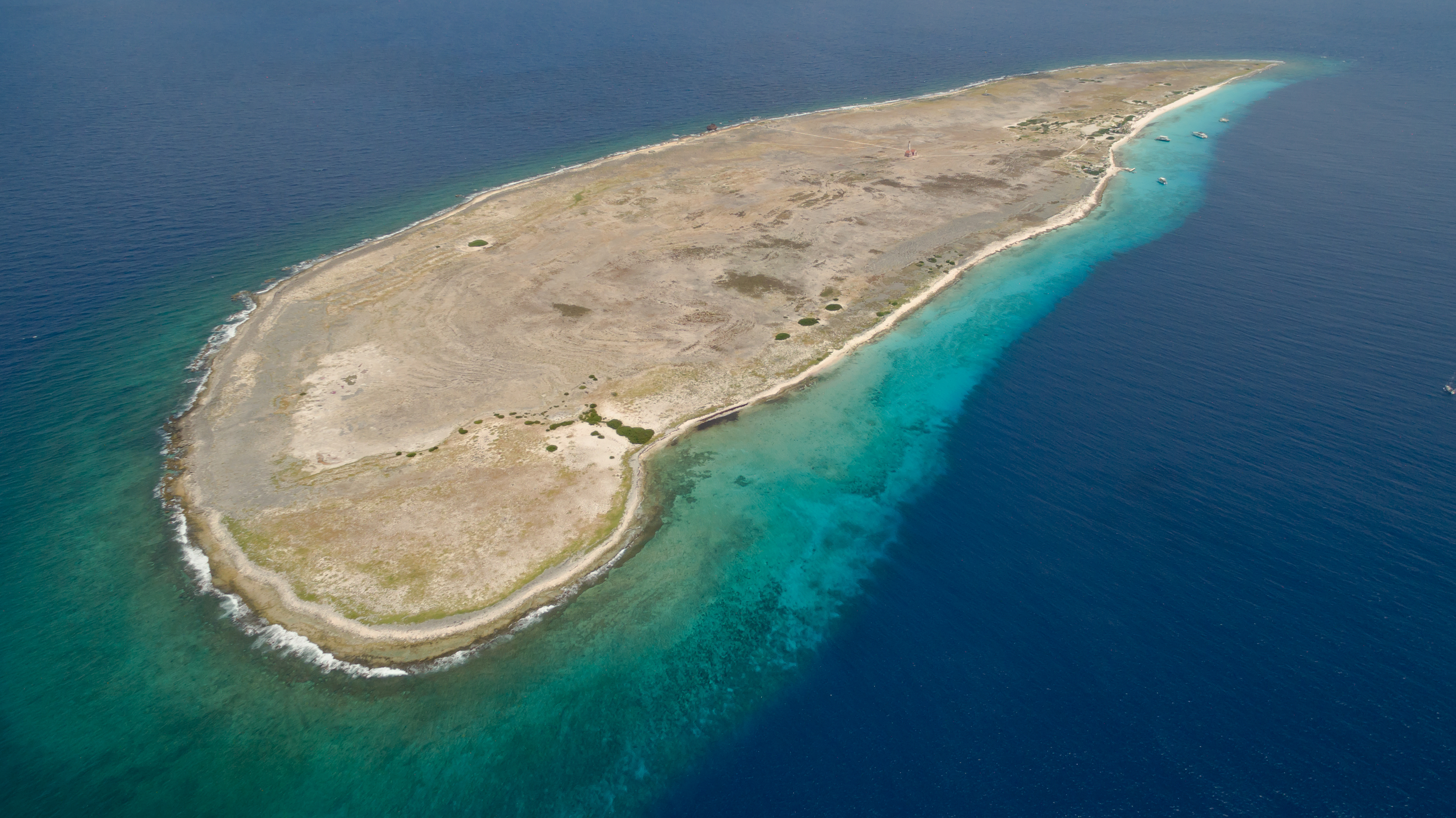 Aerial view of Klein Curaçao and its turquoise shoreline